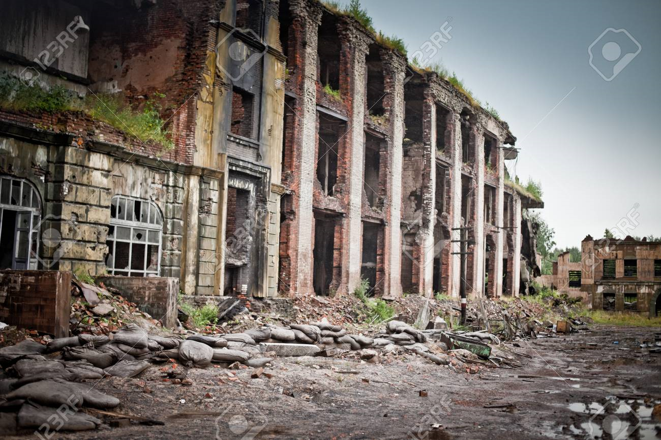 33041289-abandoned-houses-and-ruined-city-wet-and-muddy.png