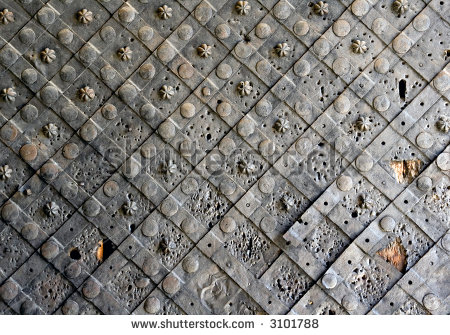 stock-photo-medieval-iron-door-damaged-during-battle-3101788.jpg