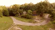 videoblocks-old-small-village-in-a-forest-medieval-countryside-life_hu4lx8dci_thumbnail-1080_01.webp